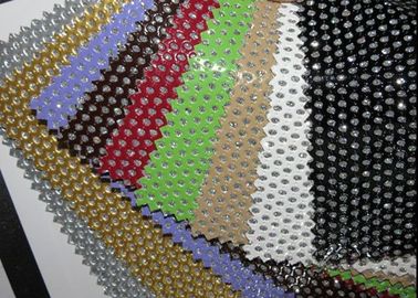 China Hole Punch Pattern PU Black Perforated Leather Fabric With Nonwowoven Backing supplier