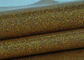 China Synthetic Mirror Leather Glitter Fabric Roll / Gold Glitter Fabric 0.4mm Thickness exporter